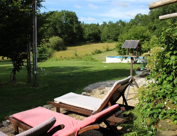 fermedelalisiere-the-gite-garden-sun-loungers-view